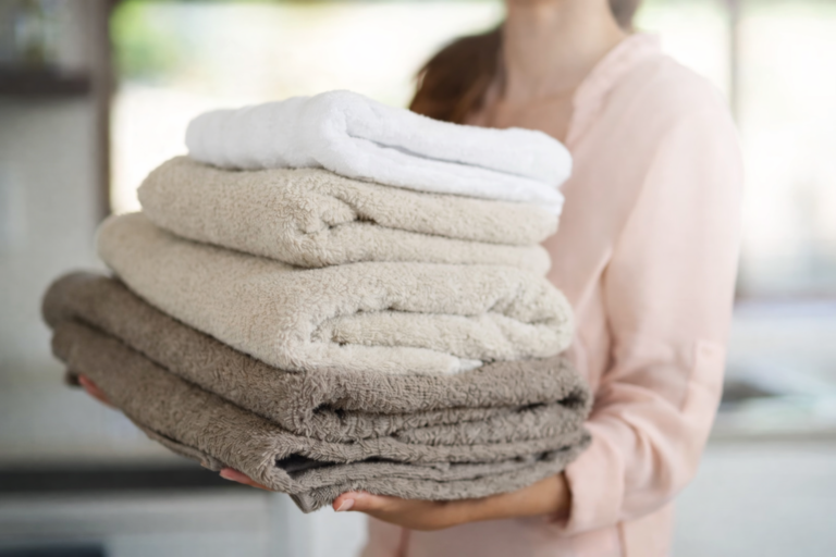 folded laundry clean towels clothes