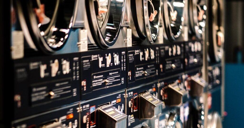 Modern laundromat interior with washing machines, Denver laundry service vs laundromat comparison