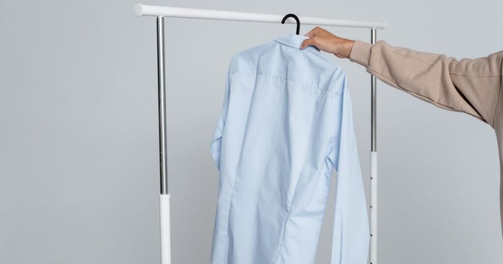 Clean pressed garment on a hanger, professional dry cleaning service in Denver